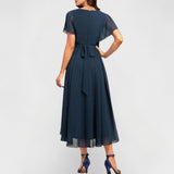 Ornella – Elegantna obleka v temno modri barvi