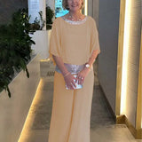 Liana – Eleganten komplet iz topa in krila