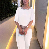 Liana – Eleganten komplet iz topa in krila
