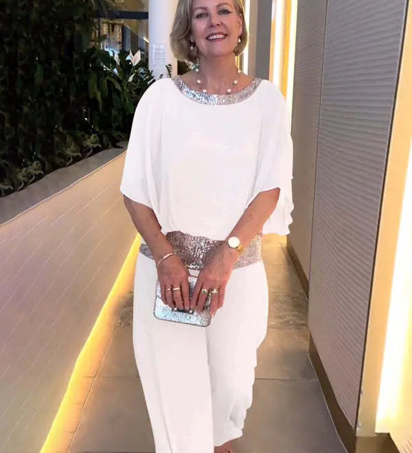 Liana – Eleganten komplet iz topa in krila